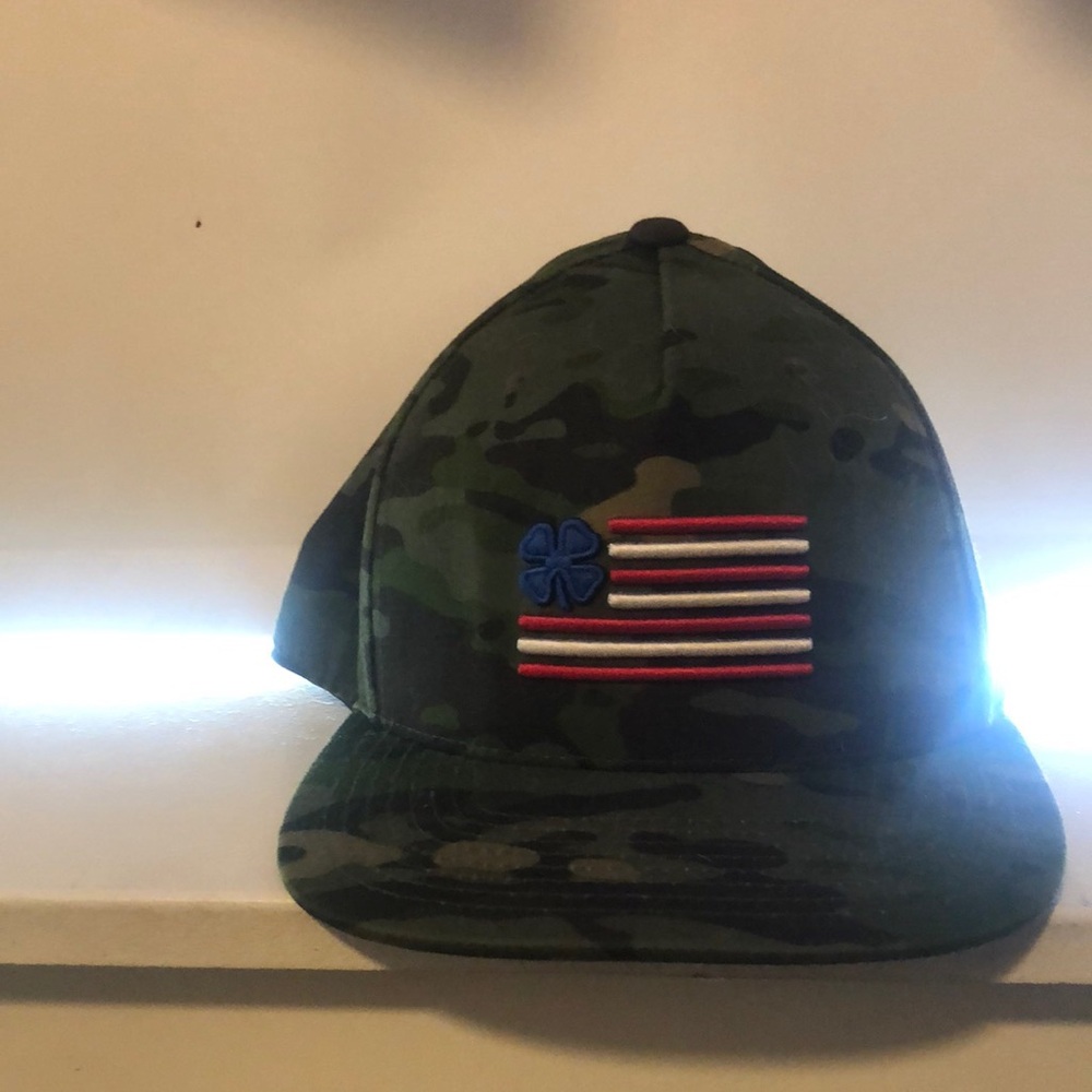 1 Brand New Black Clover Camo Hat w Flag. Adjustable. Worn once for photo shoot